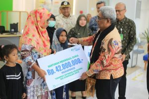 Ini Pesan Pj Bupati Aceh Utara Serahkan Santunan Kematian dan Beasiswa dari BPJS Ketenagakerjaan